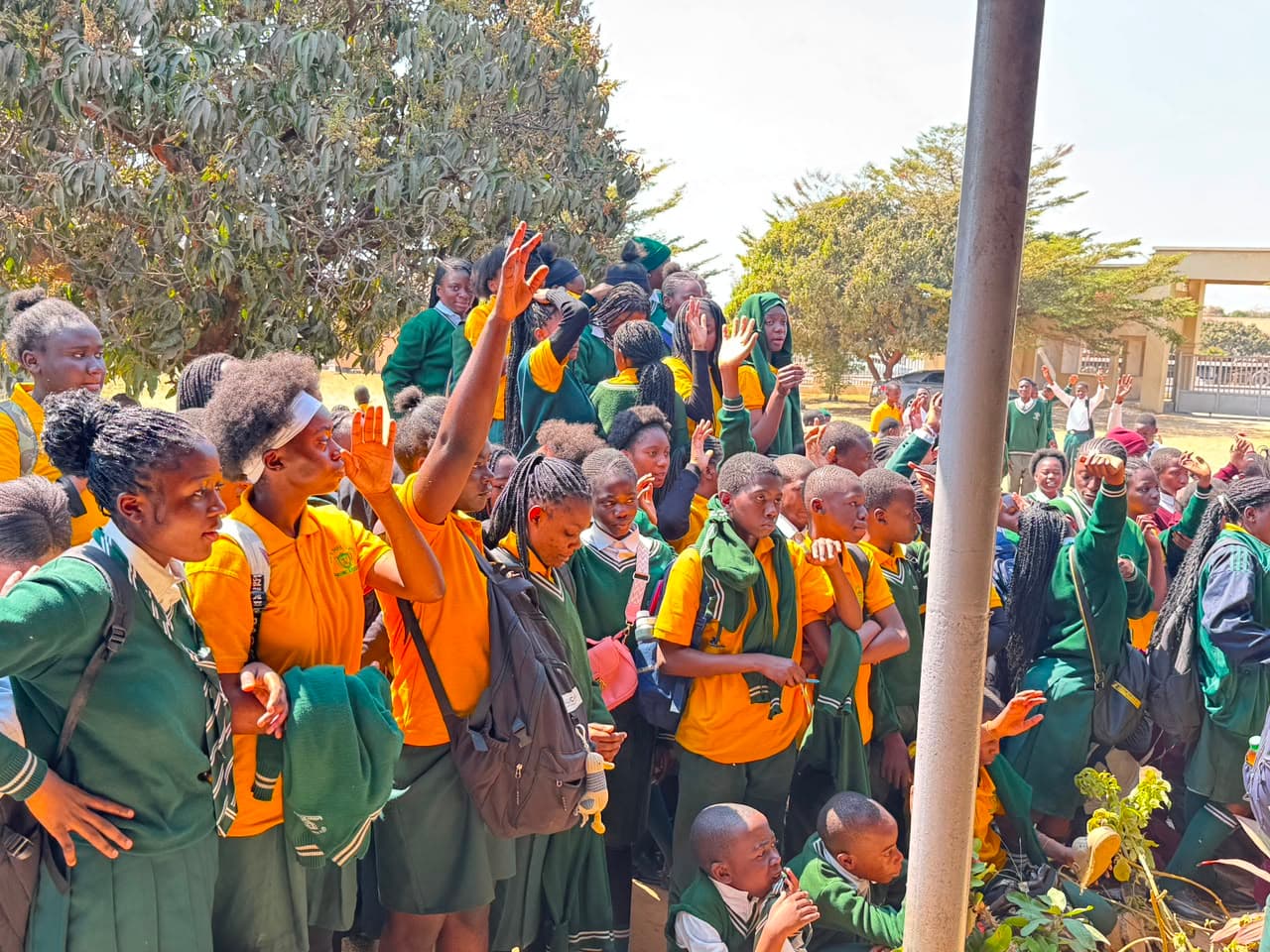 Schoolchildren responding during a Go Africa ministry gathering
