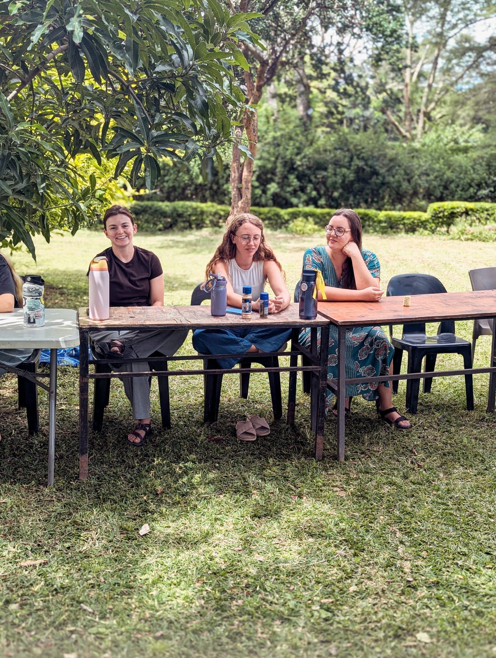 The Birth Attendant School team from YWAM Perth sitting together outdoors at the YWAM Lusaka base